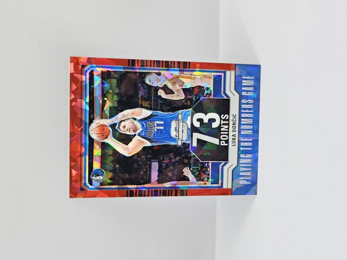 2023-24 PANINI CONTENDERS OPTIC LUKA DONCIC ''PLAYING THE NUMBERS'' RED CRACKED ICE 095/175